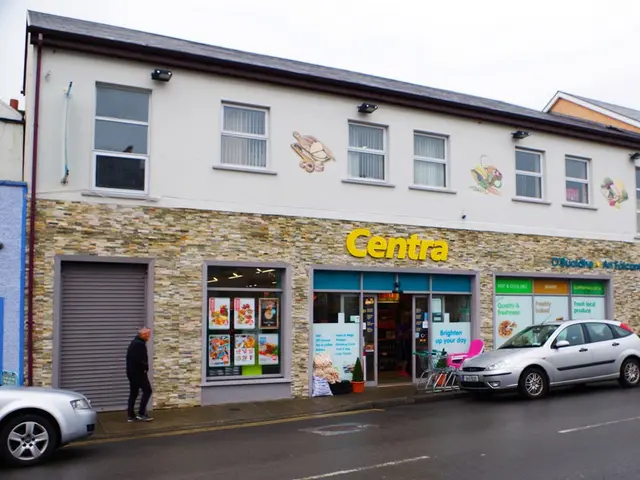 Centra convenience store storefront on a village street, with a green sign above the entrance