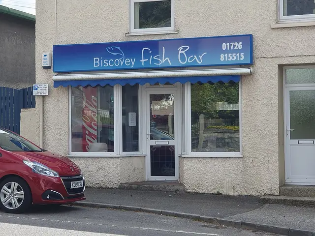 Storefront of an independent fish bar takeaway shop.