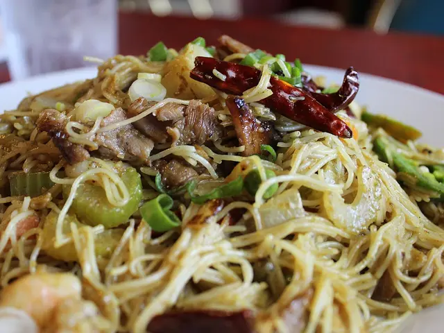 Singapore-style fried rice noodles served at Lemongrass, an Asian fusion restaurant in Bossier City, Louisiana.