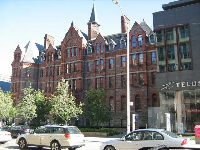 The Royal Conservatory of Music building, a large red-brick and stone building viewed from Bloor Street in Toronto.
