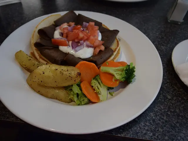 A gyros platter served at a Greek restaurant.