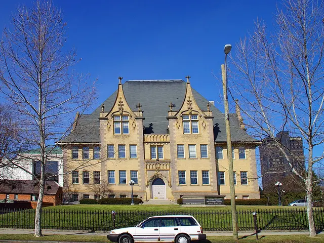 The exterior of a historic school for the deaf building, with no people visible.