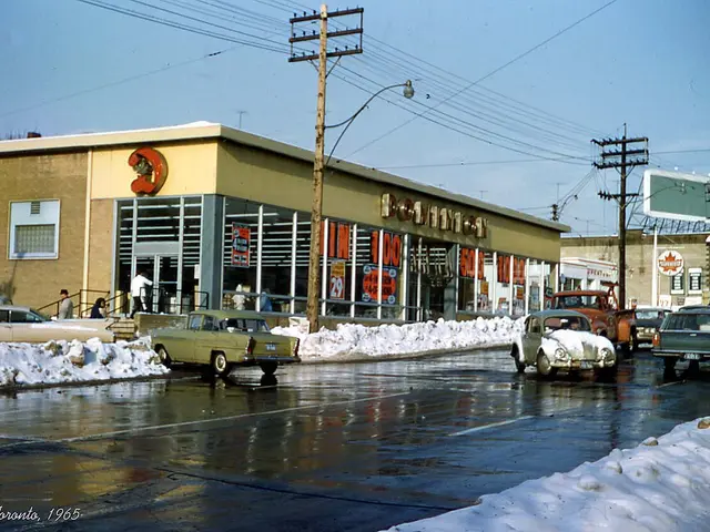The storefront exterior of a grocery store in a Toronto neighbourhood, photographed in 1965.