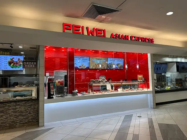 Exterior of a Pei Wei Asian Express restaurant at Dadeland Mall in Miami, Florida.
