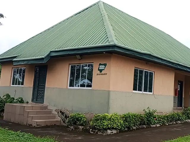 A single-storey building with a green roof, the School of Driving at Obafemi Awolowo University in Ile-Ife, Nigeria.