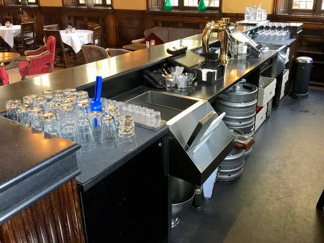 Bar counter with a draft beer tap at the whisky bar in the Grand Hotel Terminus, Bergen, Norway.