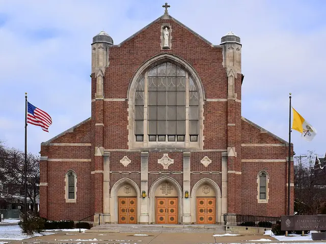 Exterior of Saint Augustine Cathedral, a brick church building in Kalamazoo, Michigan.