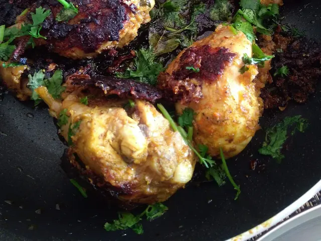Marinated chicken drumsticks that have been shallow fried.