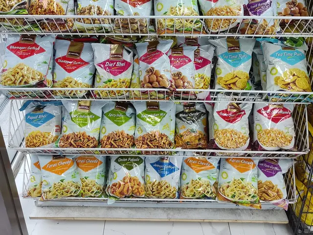 A view down an aisle of South Asian grocery products inside Bhavika grocery store in a Hong Kong shopping mall.
