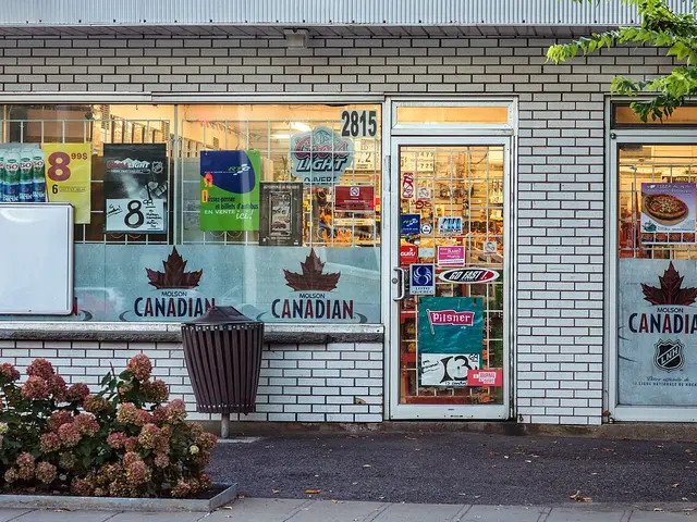 Exterior of a convenience store storefront in Quebec.