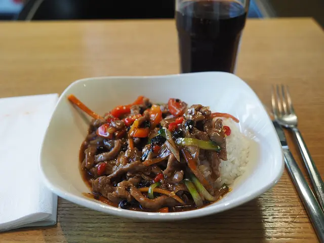 A Korean beef dish with rice served at a Korean restaurant.