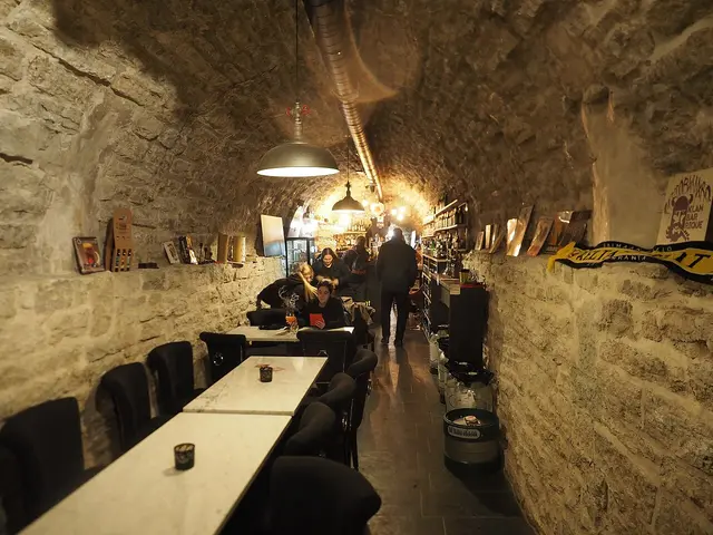 Interior dining area of the restaurant 100 õlle koht in Tallinn, Estonia.