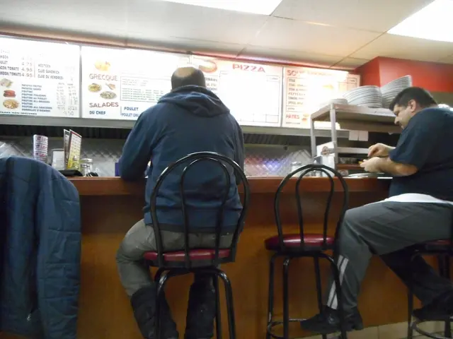 The counter area of a pizzeria restaurant in Montreal.
