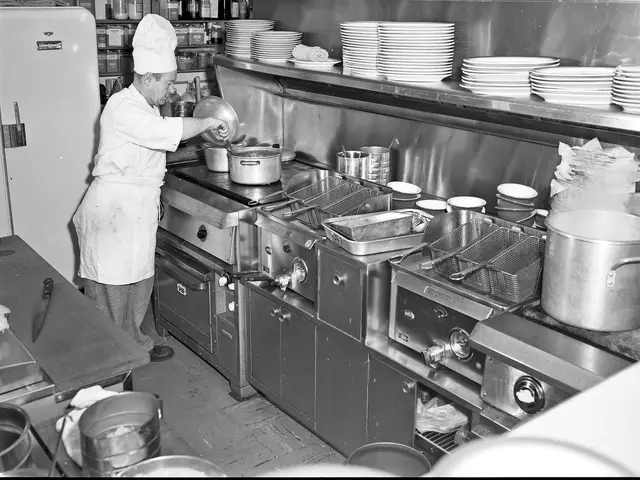 A 1954 photograph of a restaurant cook at work in Seattle, Washington.