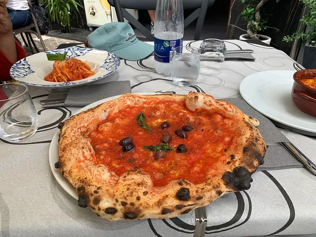A Neapolitan-style pizza served at a restaurant in Pompeii, Italy.