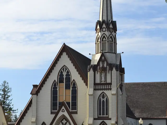 First Presbyterian Church of Napa, California, a white wooden Gothic Revival church with an ornate tall spire and pointed-arch windows.
